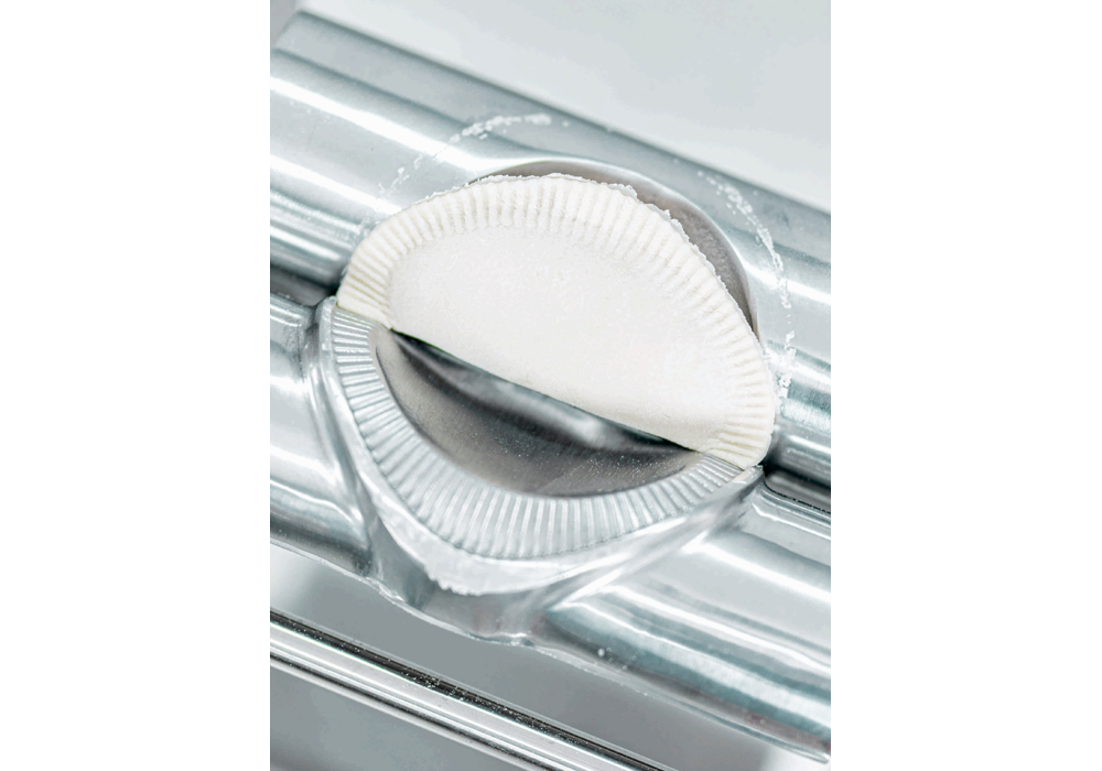 Crimped filled turnover formed in a commercial turnover press